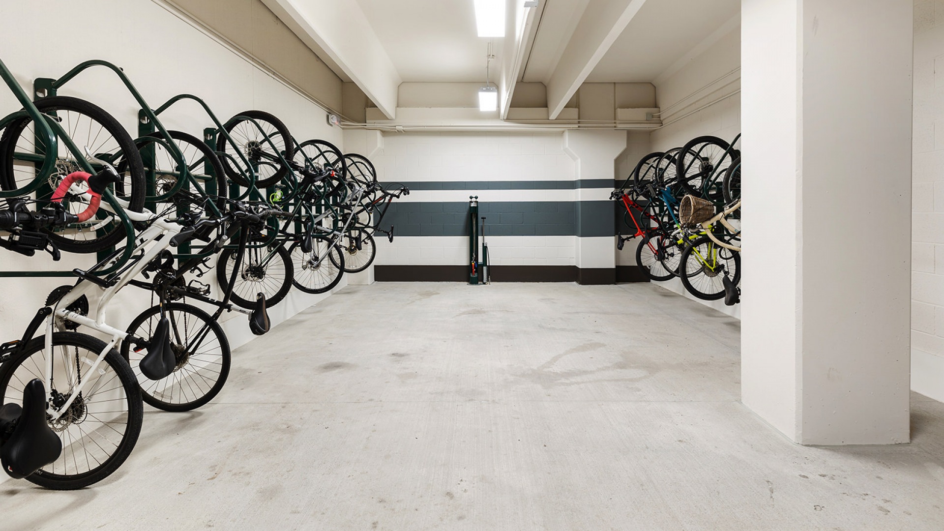 The bike storage room at our apartments in Houston, featuring bicycles hanging out racks mounted on the walls.